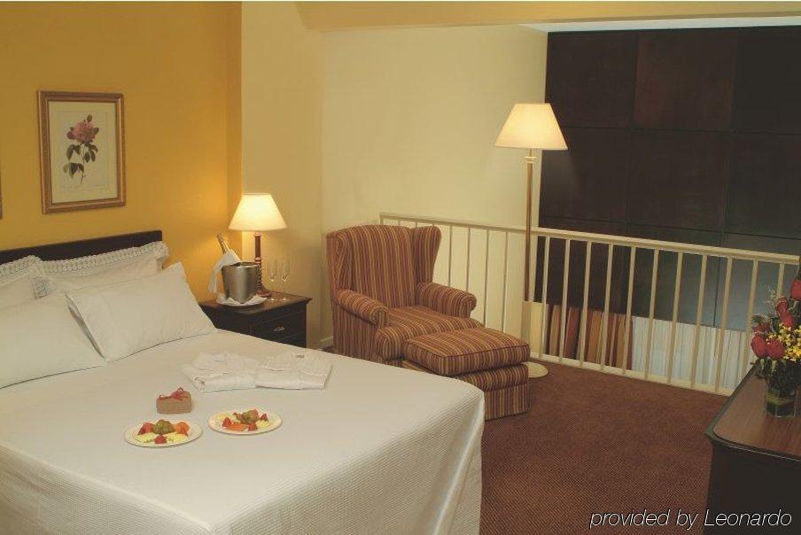 Hotel Deville Curitiba Zimmer foto